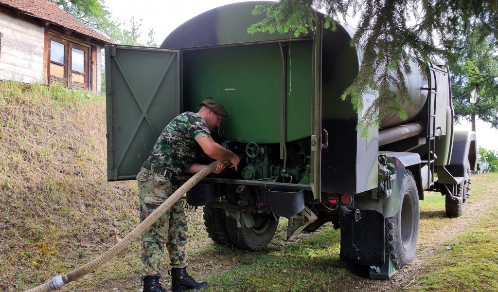 Members of SAF provide assistance to villagers in Prijepolje municipality