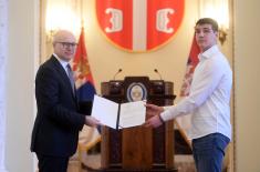 Minister Vučević presents scholarship contracts