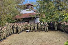 Cadets and students complete loaded march