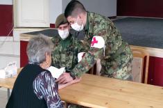 Military physicians provide assistance to village residents in Loznica and Ražanj