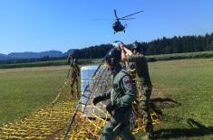 SAF troops help citizens of Slovenia mitigate effects of flooding