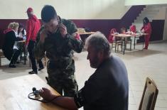 Military physicians provide assistance to village residents in Loznica and Ražanj