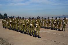 Soldiers doing military service perform first parachute jumps