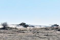 Tank, infantry units conduct live fire drills