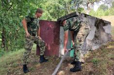 Members of SAF provide assistance to villagers in Prijepolje municipality