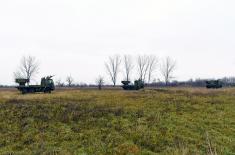 Crews using modern artillery systems conduct regular training