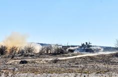 Tank, infantry units conduct live fire drills