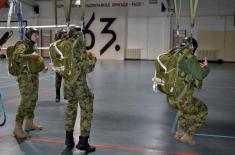 Soldiers performing military service undergo basic parachute training