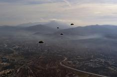 Soldiers doing military service perform first parachute jumps