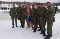 Holy Cross in the hands of Serbian Armed Forces members