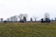 Crews using modern artillery systems conduct regular training
