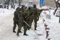 Cadets clearing snow in Clinical Center and Zemun hospital