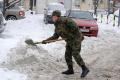 Cadets clearing snow in Clinical Center and Zemun hospital