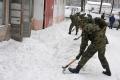 Cadets clearing snow in Clinical Center and Zemun hospital