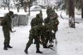 Cadets clearing snow in Clinical Center and Zemun hospital