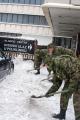 Cadets clearing snow in Clinical Center and Zemun hospital