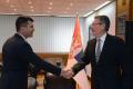 Minister Djordjevic talks to Ambassador Chepurin