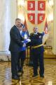 Awarding medals for dilligent service