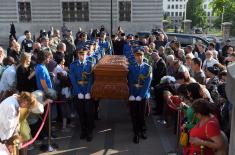 Members of Serbian Armed Forces Guard carry sarcophagus with Saint Bishop Nikolaj