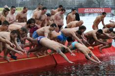 MA cadet swam first to the Holy Cross 