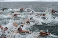 MA cadet swam first to the Holy Cross 