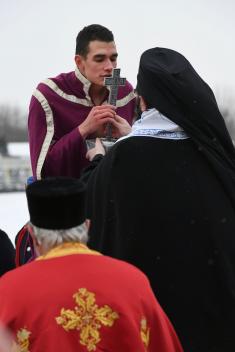 MA cadet swam first to the Holy Cross 