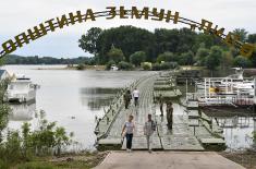 Over pontoon bridge of the Serbian Armed Forces securely and safely to the Lido beach