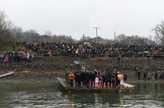 Members of the Serbian Armed Forces swimming for the Holy Epiphany Cross across Serbia