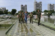 Over pontoon bridge of the Serbian Armed Forces securely and safely to the Lido beach