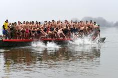 Members of the Serbian Armed Forces swimming for the Holy Epiphany Cross across Serbia