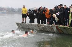 Members of the Serbian Armed Forces swimming for the Holy Epiphany Cross across Serbia