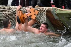 Members of the Serbian Armed Forces swimming for the Holy Epiphany Cross across Serbia