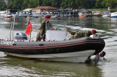 Over pontoon bridge of the Serbian Armed Forces securely and safely to the Lido beach