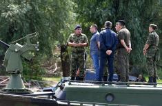 Over pontoon bridge of the Serbian Armed Forces securely and safely to the Lido beach