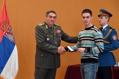 Conferring awards to the soldiers who have completed voluntary military service