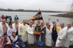 Members of the Serbian Armed Forces swimming for the Holy Epiphany Cross across Serbia