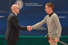Minister Vučević presents medieval Serbian swords and sabres to officers who completed advanced training abroad