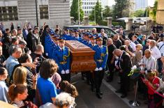 Members of Serbian Armed Forces Guard carry sarcophagus with Saint Bishop Nikolaj