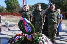 Minister Vučević unveils memorial plague, lays wreath at war volunteer Janoš Rauk’s grave