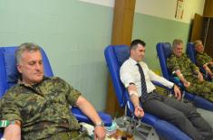 Minister Djordjevic with associates donated blood 