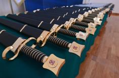 Minister Vučević presents medieval Serbian swords and sabres to officers who completed advanced training abroad