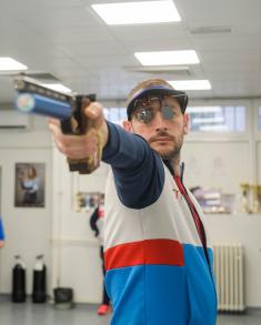 Minister Stefanović and Serbian national shooting team members with military school students  