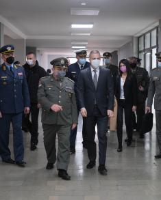 Minister Stefanović and Serbian national shooting team members with military school students  