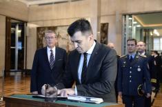 Djordjevic signs book of condolences at Russian Embassy 