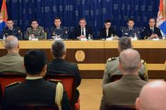 Foreign military representatives receive briefing