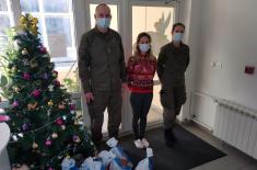 Traditional New Year humanitarian action by members of “Kobre”