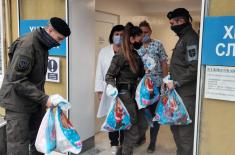 Traditional New Year humanitarian action by members of “Kobre”