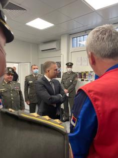 Minister Stefanović and Serbian national shooting team members with military school students  