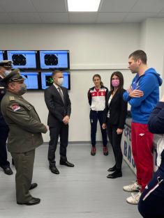 Minister Stefanović and Serbian national shooting team members with military school students  