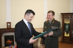 Medal for strengthening military cooperation with Belarus presented to Minister Djordjevic